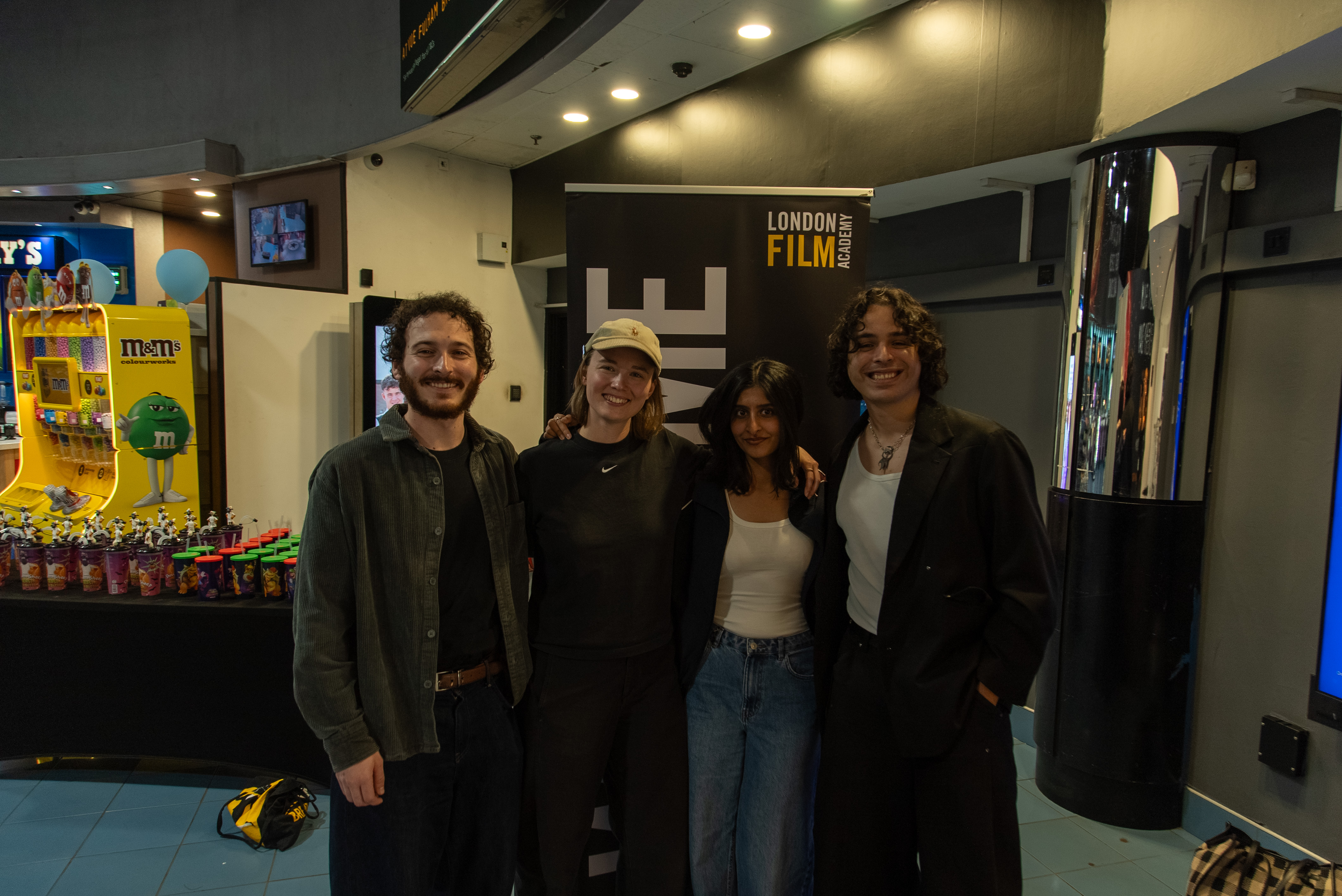 LFA Alumni Panel - group on Alumni stood outside cinema